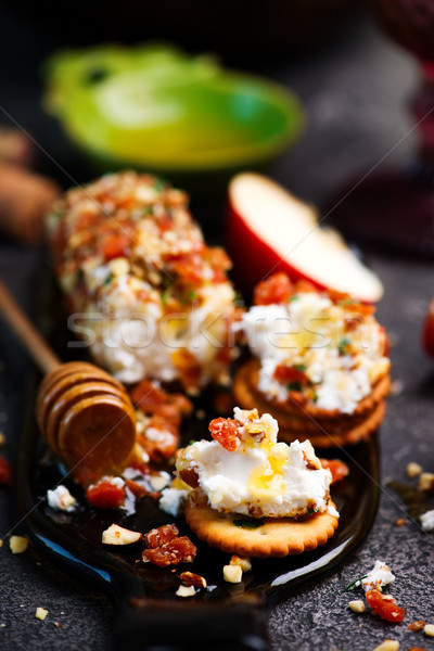 HONEY, APRICOT, AND ALMOND GOAT CHEESE SPREAD.selective focus Stock photo © zoryanchik