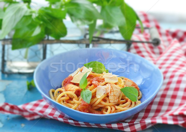 Stock photo: spaghetti with calamary tomatoes and basil