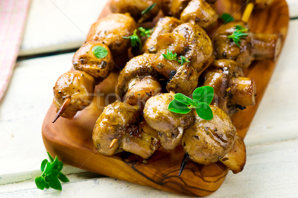 champignons a grill on skewers Stock photo © zoryanchik