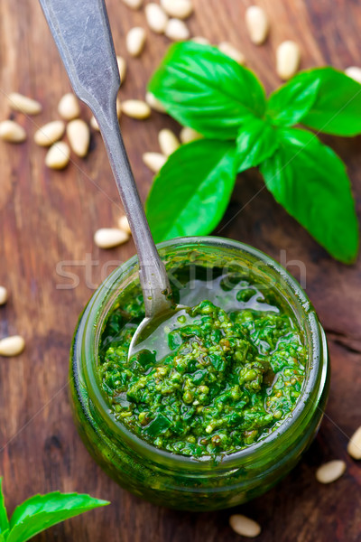 pesto sauce in a glass jar Stock photo © zoryanchik