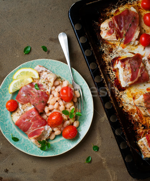 the baked cod with beans Stock photo © zoryanchik