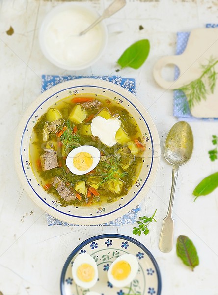 Sorrel  egg and sour cream soup . Stock photo © zoryanchik