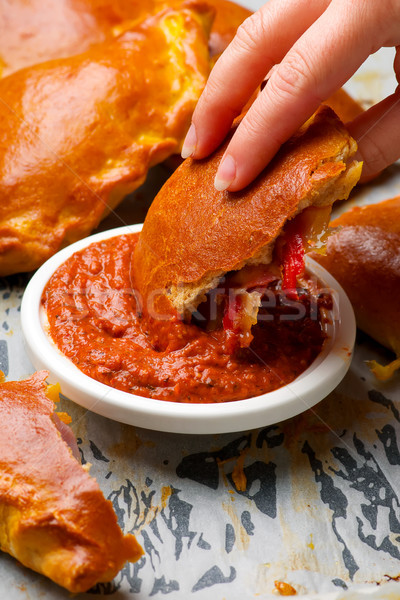 Pizza tasca salsa di pomodoro messa a fuoco selettiva cena rosso Foto d'archivio © zoryanchik