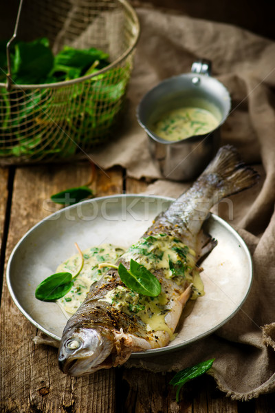 trout stewed with sauce from a sorrel. Stock photo © zoryanchik