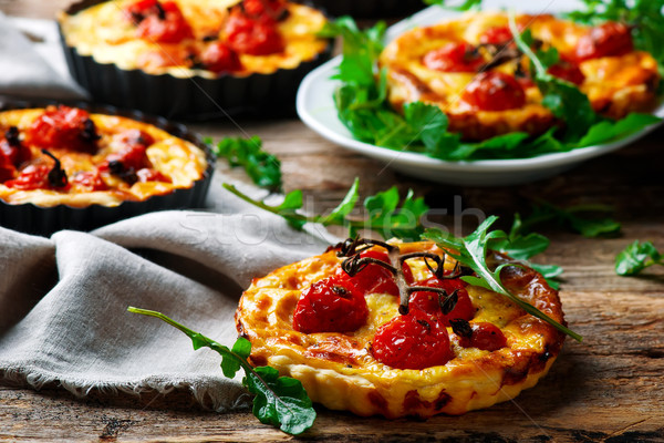 roasted cherry tomato and  goat's cheese quiche. Stock photo © zoryanchik