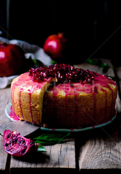 Stock photo: tangerine bundt cake with pomegranate glaze..selective focus