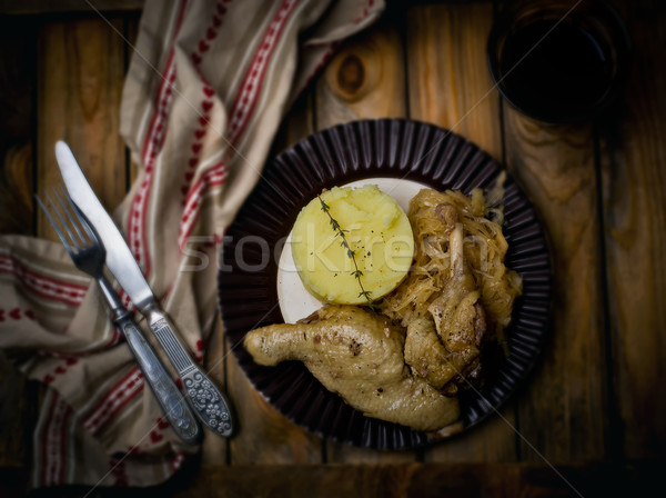 Confit from a duck, stewed sauerkraut and mashed potatoes.  Stock photo © zoryanchik