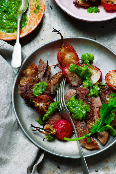 RIB-EYE STEAKS WITH RADISH GREENS CHIMICHURRI SAUCE.style rustic. Stock photo © zoryanchik