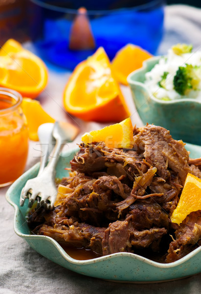 Slow Cooker Braised Pork with a Rum-Orange Sauce. Stock photo © zoryanchik