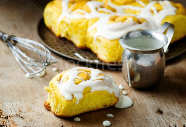 cinnamon roll with pumpkin and glaze Stock photo © zoryanchik