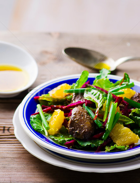 salad with beet and a chicken liver on  Stock photo © zoryanchik