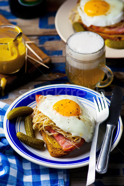 sandwich with sauerkraut , ham and fried eggs Stock photo © zoryanchik