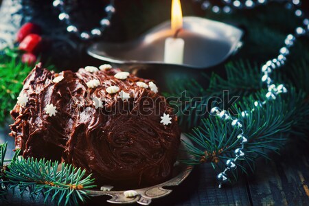 Yule log on a Christmas background. Stock photo © zoryanchik