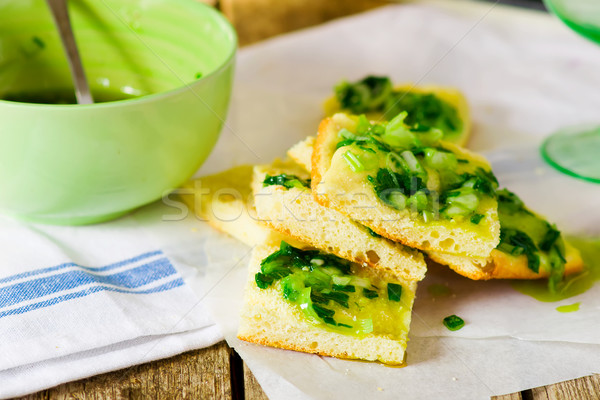house focaccia with green onions sauce. Stock photo © zoryanchik