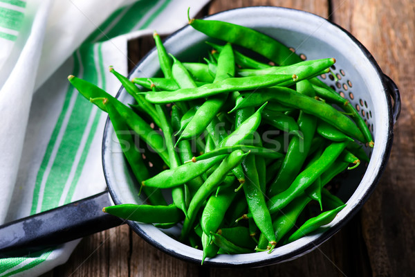 fresh, organic green beans in a vintage colander Stock photo © zoryanchik