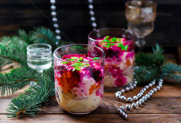 Traditional Russian New Year's herring salad Stock photo © zoryanchik