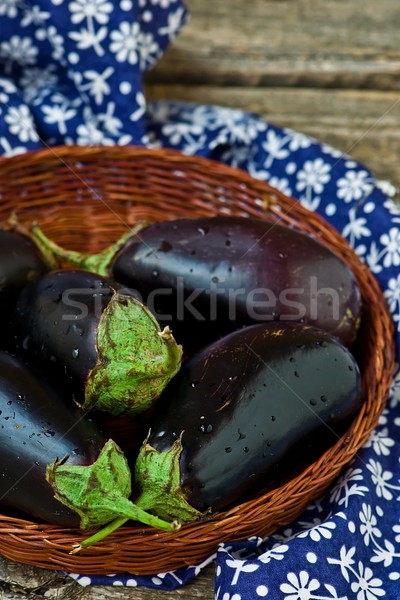 fresh, organic eggplants in a wattled basket  Stock photo © zoryanchik