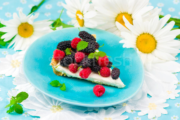 slice of a tart with fresh berries. Stock photo © zoryanchik