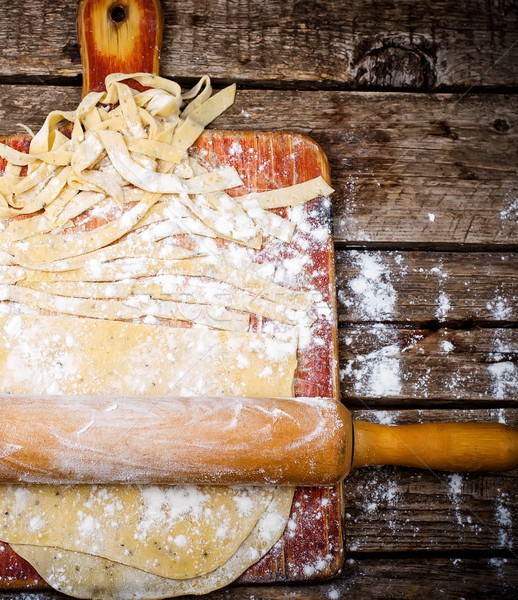 self-made noodles on a wooden table Stock photo © zoryanchik