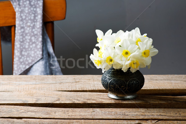 bouquet of narcissuses in vintage vase.style rustic Stock photo © zoryanchik