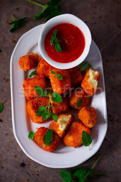 Halloumi Nuggets with Marinara Dipping Sauce.selective focus Stock photo © zoryanchik