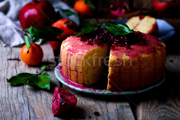 tangerine bundt cake with pomegranate glaze..selective focus Stock photo © zoryanchik