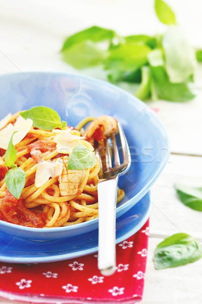 spaghetti with calamary tomatoes and basil Stock photo © zoryanchik