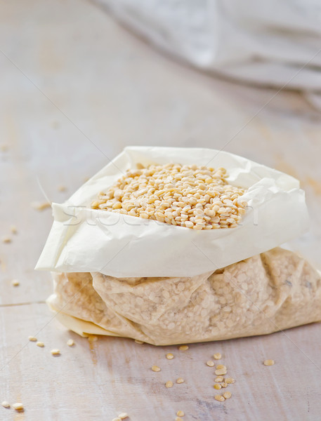 Stock photo: dry  moong dal in a paper sack. 
