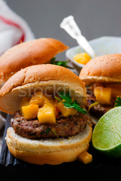 turkey burgers with mango salsa.style rustic Stock photo © zoryanchik