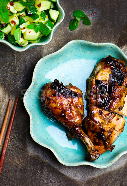 the chicken baked in Asian style and cucumber salad  Stock photo © zoryanchik