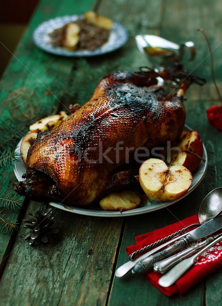 the Christmas baked goose with apples Stock photo © zoryanchik