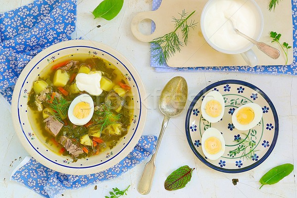 Sorrel  egg and sour cream soup . Stock photo © zoryanchik