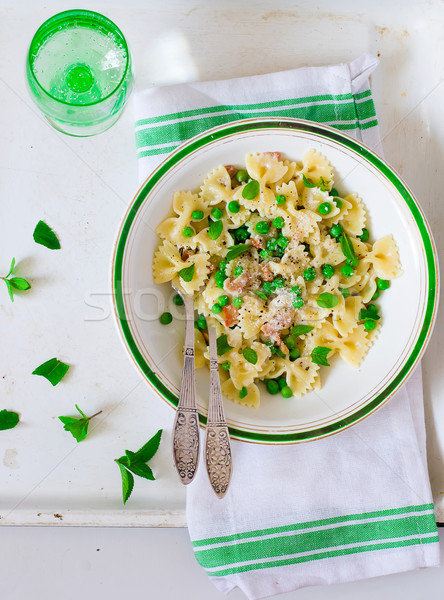 pasta with green peas and creamy sauce Stock photo © zoryanchik
