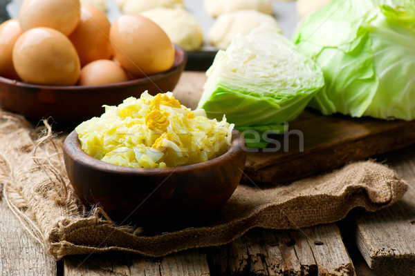    Pie and vareniki cabbage stuffing.style rustic Stock photo © zoryanchik