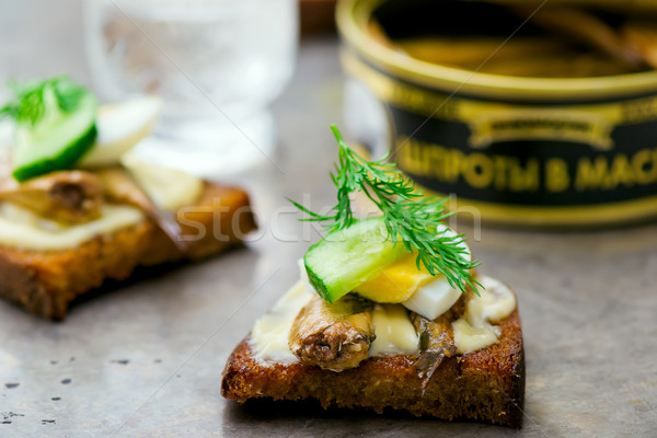 toasts with tinned sprats Stock photo © zoryanchik