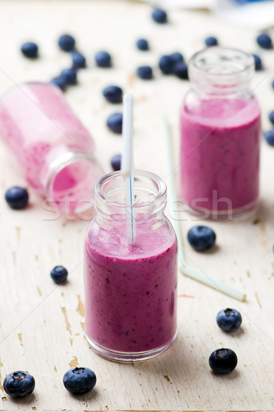 bilberry smoothie in glass small bottles Stock photo © zoryanchik