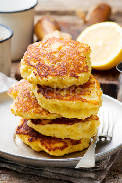 LEMON RICOTTA PANCAKES WITH BLUEBERRY SAUCE. Stock photo © zoryanchik