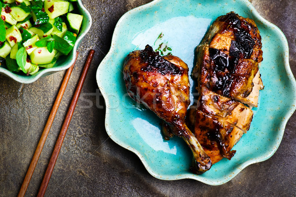 the chicken baked in Asian style and cucumber salad  Stock photo © zoryanchik