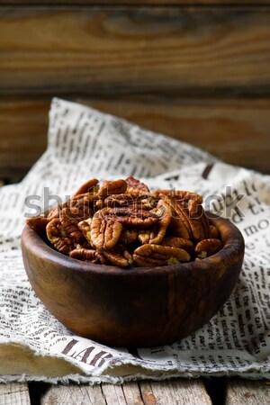 a pecan is in a wooden bowl. style rustic  Stock photo © zoryanchik
