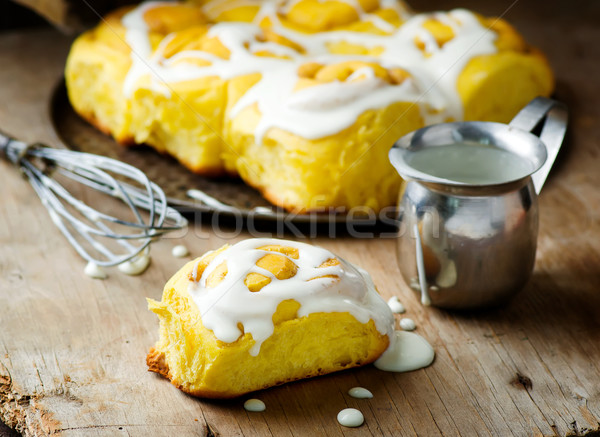 cinnamon roll with pumpkin and glaze Stock photo © zoryanchik