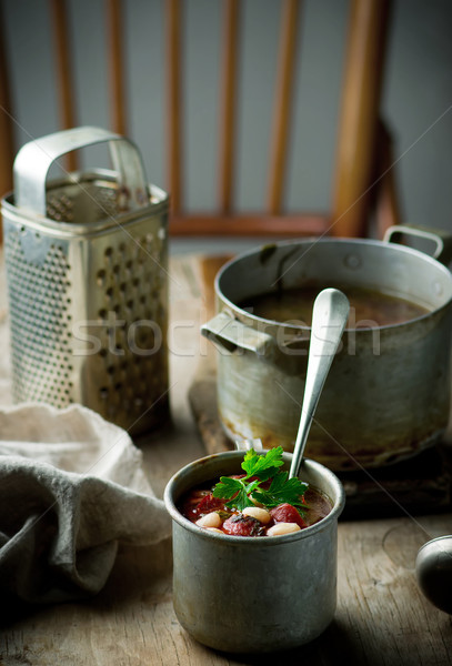 Minestra di fagioli salsicce metal mug stile rustico Foto d'archivio © zoryanchik