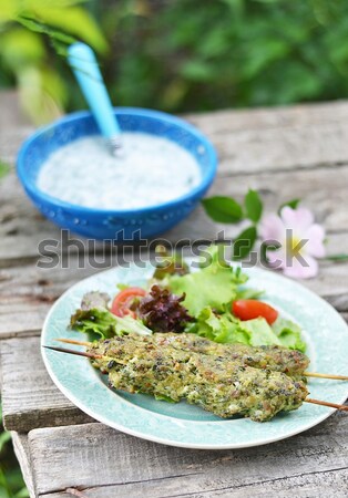 Beet salad with arugula and cheese feta. Stock photo © zoryanchik