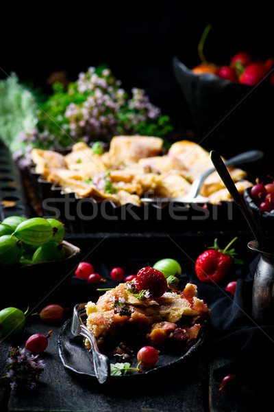 Patchwork  strawberry and gooseberry pie. dark photo Stock photo © zoryanchik