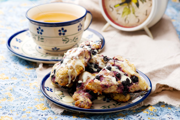 Blueberry scone  with Cinnamon Cream Cheese Glaze Stock photo © zoryanchik