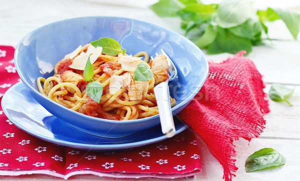 spaghetti with calamary tomatoes and basil Stock photo © zoryanchik