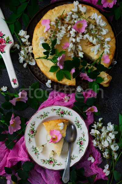 SOFT CAKE WITH WHITE CHOCOLATE RICOTTA AND ACACIA FLOWERS.style vintage.style rustic Stock photo © zoryanchik