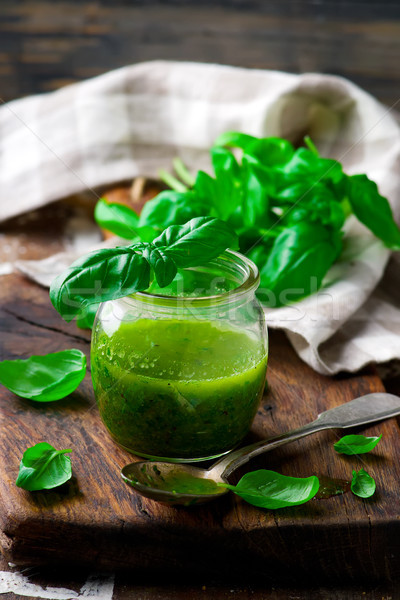 BASIL VINAIGRETTE in glass jar. rustic style.  Stock photo © zoryanchik