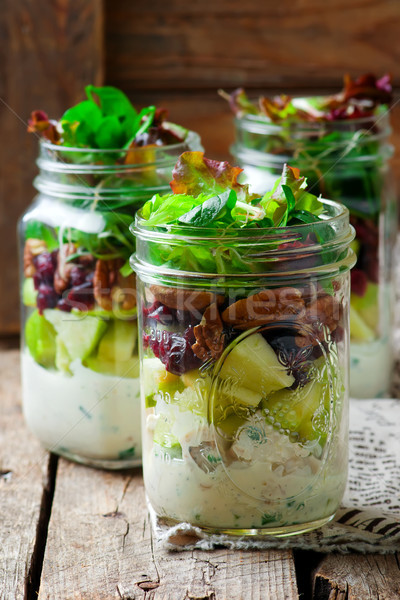 chicken, apple and pecan salad in a jar.style rustic. Stock photo © zoryanchik