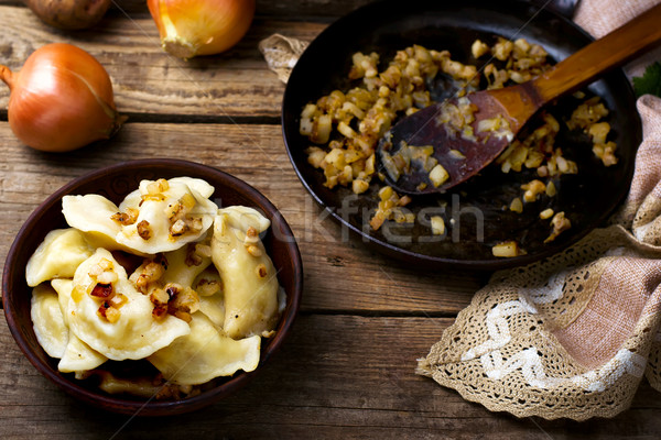 Stock photo: Potatoes vareniki in a ceramic bowl. 