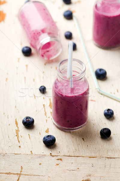 bilberry smoothie in glass small bottles Stock photo © zoryanchik